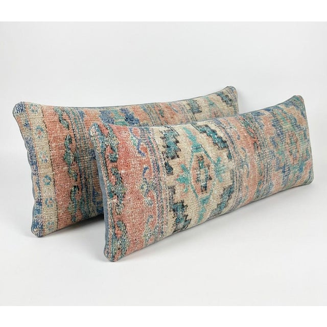 This beautiful 14'' x 47'' & 14'' x 48'' pillow cover set was made from authentic Turkish rug pieces. Bright colors of...