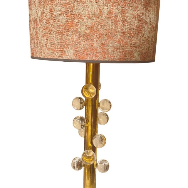 Pair of table lamps with details crafted from Murano glass. Italian design, Mid-Century. Table lamp with a circular base...