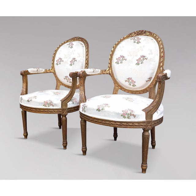 Elegant pair of Louis XVI style armchairs in gilded wood. Fabric from Maison Lelievre. 19th century period.