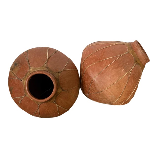 Mid-20th Century Mexican Tarahumara Rawhide-Bound Clay Ollas - A Pair For Sale