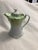 This beautiful creamer is a rare find in this condition and this color. It has a pale green color with gold accents,...
