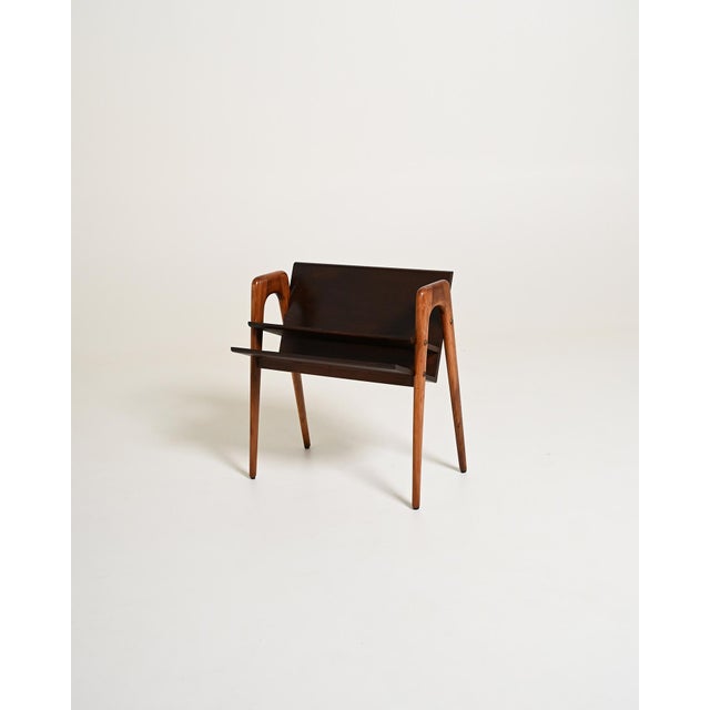 Beech frame with ash-covered container and double front magazine rack. 1950s. Magazine rack made with a beech frame and...