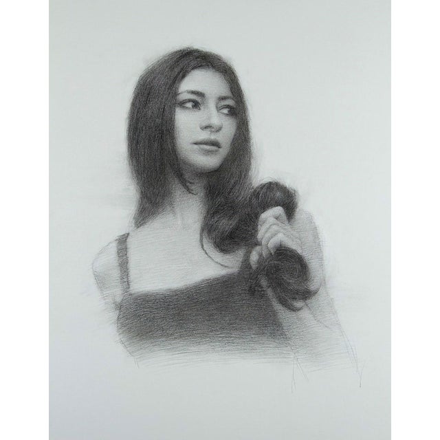 This charcoal drawing presents a young woman holding a lock of her long hair, her contemplative expression inviting...