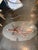 Iconic Italian Modern coffee table in the style of Paolo Buffa, featuring a sculptural walnut spider base with brass...