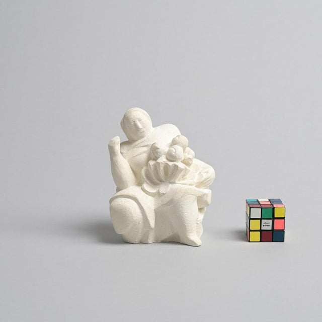 This abstract sculpture in plaster was made by the Belgian artist Jan Keustermans. The sculpture has a rough plaster...