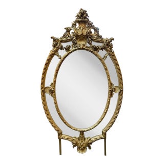19th Century Large Scale French Oval Carved and Giltwood Mirror For Sale