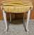 This vintage upholstered vanity stool features a classic French-inspired silhouette with elegant cabriole legs and a...