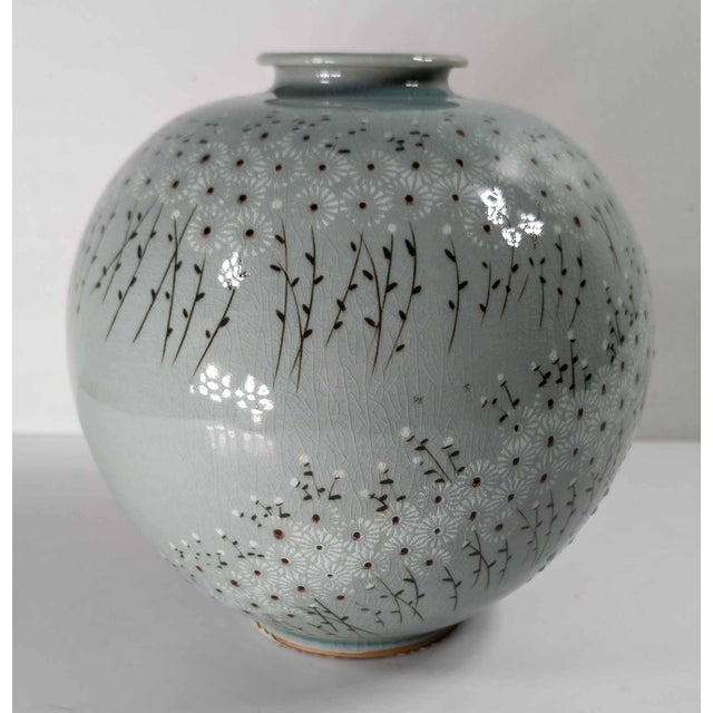 We are selling this nice Mid-Century Korean Celadon Vase. This vase is done in the Antique Koryo style of celadon with a...