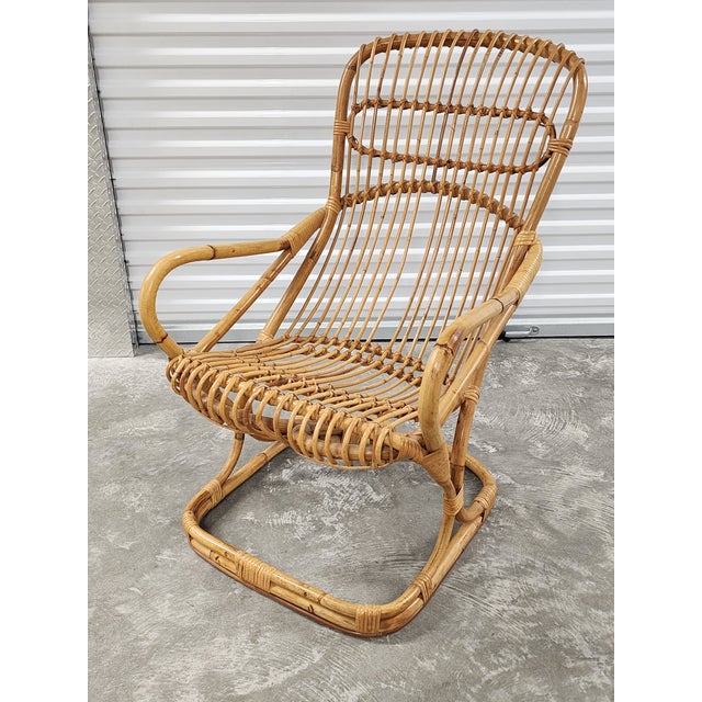 Mid Century 1960s Tito Agnoli bamboo and rattan high back lounge armchair with beautiful curved form. This is a very...