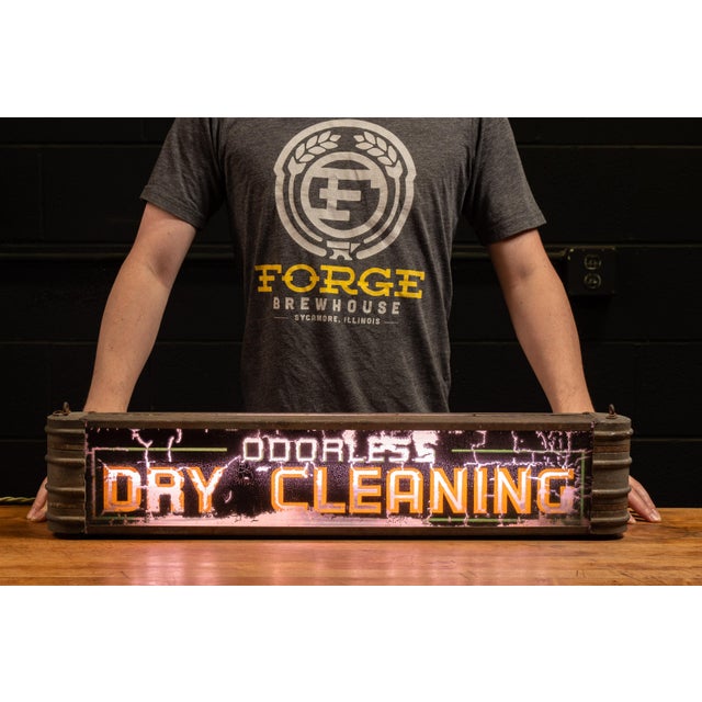 Streamline Art Deco lighted storefront dry cleaning sign. This piece exhibits the classic curves and parallel lines...