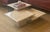 Vintage set of three stackable square travertine coffee tables, originally purchased from Friends of Form. The versatile...