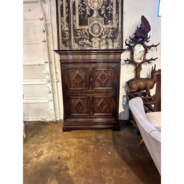 19th century French carved oak 4 door cabinet. Circa 1880. Perfect for today's transitional designs!