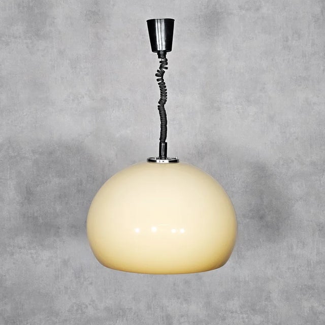 Pendant Lamp by Guzzini for Meblo, in Flawless conditions. Designed 1970 to 1979 This piece has an attribution mark, I am...