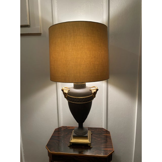 Fine Neoclassical Urn Lamp, black basalt with intricate classical raised decoration and gilt accents, pair of gold gilt...