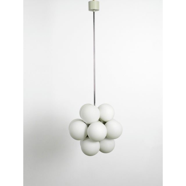 Very rare and still unused 1960s atomic space age metal ceiling lamp with 12 glass balls. manufacturer ia kaiser leuchten....