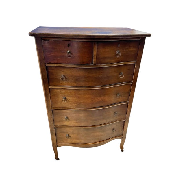 19th Century Antique Dresser The dresser features a classic, curved silhouette, giving it an elegant and timeless...