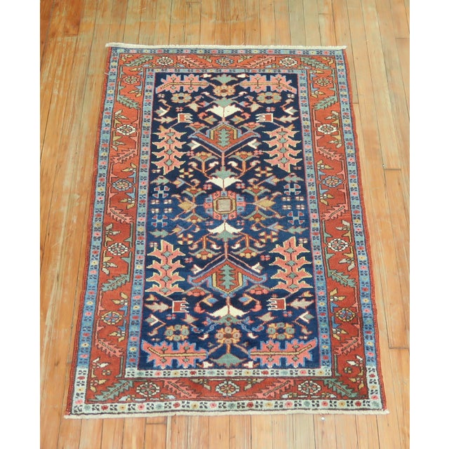 Antique Persian Heriz rug with a geometric motif on a vibrant navy blue ground. Great condition & quality. If you...