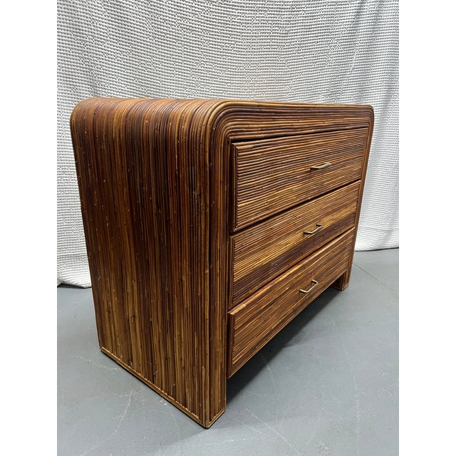1970s vintage split reed 3 drawer chest or petite dresser in the manner of Gabriella Crespi. Pencil reed rattan wrapping...