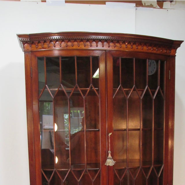 This cabinet is magnificent. The display made of mahogany made by the exceptional cabinet maker Joseph Gerte of Boston....