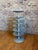 Bring raw, heavy-duty factory grit into your space with this salvaged industrial multi-tier carousel axle. This solid...