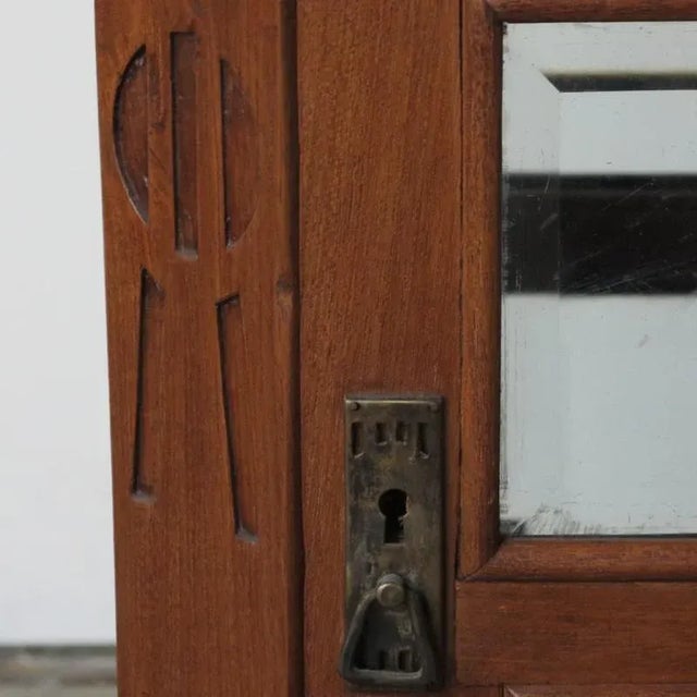 The cabinets open on both sides with doors.