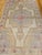 This elegant Vintage Turkish Oushak area rug was hand knotted in western Anatolia in the mid-1900s, the rug features a...