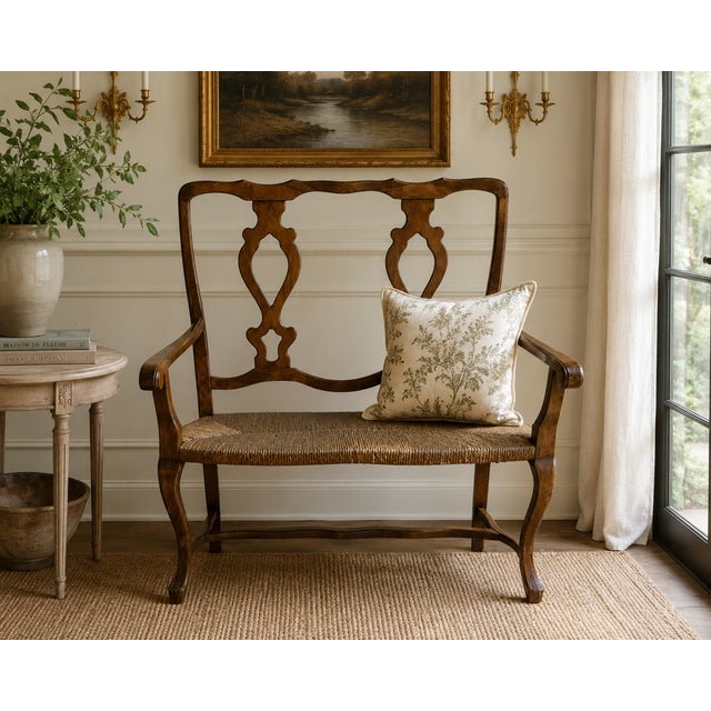 Graceful and inviting, this French Provincial-style settee combines classic European lines with the warmth of natural...