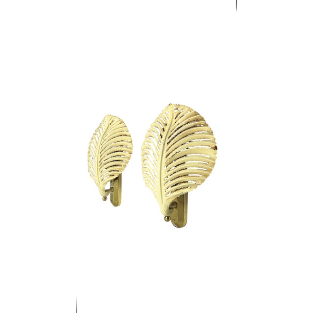 Originally from Banci, Florence, Italy. Handcrafted wall lamps with openwork leaf motifs, made from metal painted in off-...