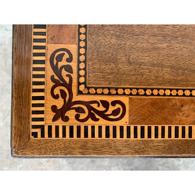 19th century Baroque Spanish side table with marquetry geometricals figures 19th century Spanish trestle table in walnut....