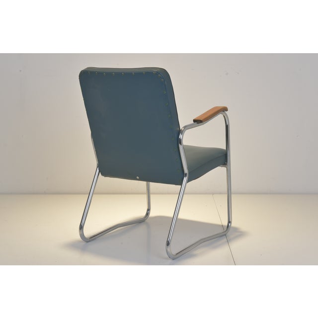 Mauser Tubular Steel Armchair, Germany, circa 1958 This elegant armchair by Mauser, manufactured around 1958, exemplifies...