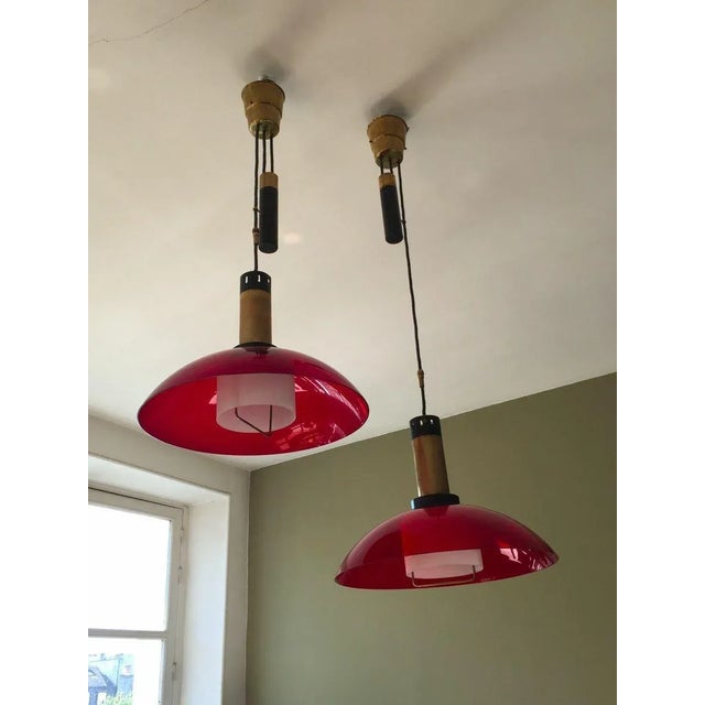 Exceptional pair of counterweights suspensions, Modernism, Bauhaus, Constructivist, free-form, black lacquered metal,...