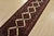 An authentic vintage tribal Hamedan runner hand-knotted with fine wool and natural dyes. This nomadic rug features a row...