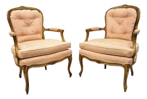 Early 20th Century French Louis XV Provincial Style Carved Walnut Cane Back Arm Chairs - a Pair