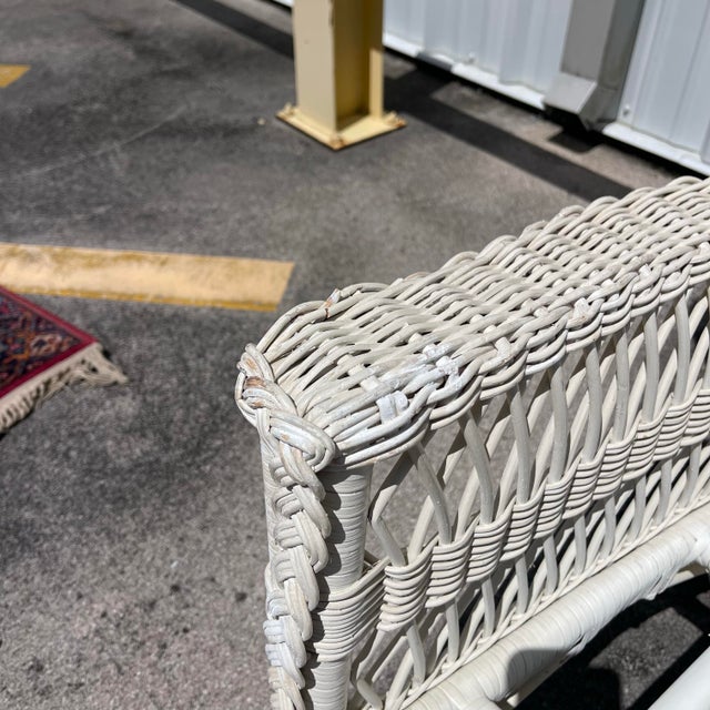 Charming and unusual wingback or peacock chair. Given seat height measurement is measured without cushion.