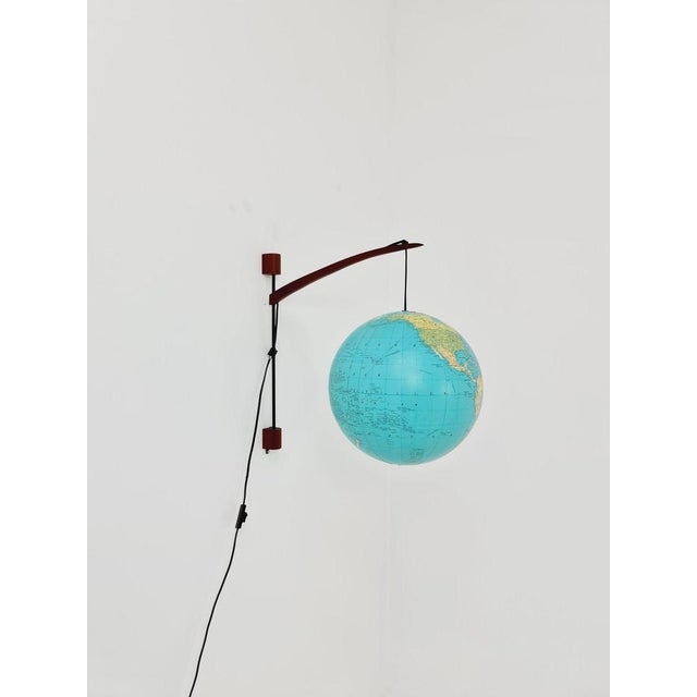 German Teak vintage Globe wall lamp, 1960s Made in West Germany Both the shade and the lamp are in Good condition....
