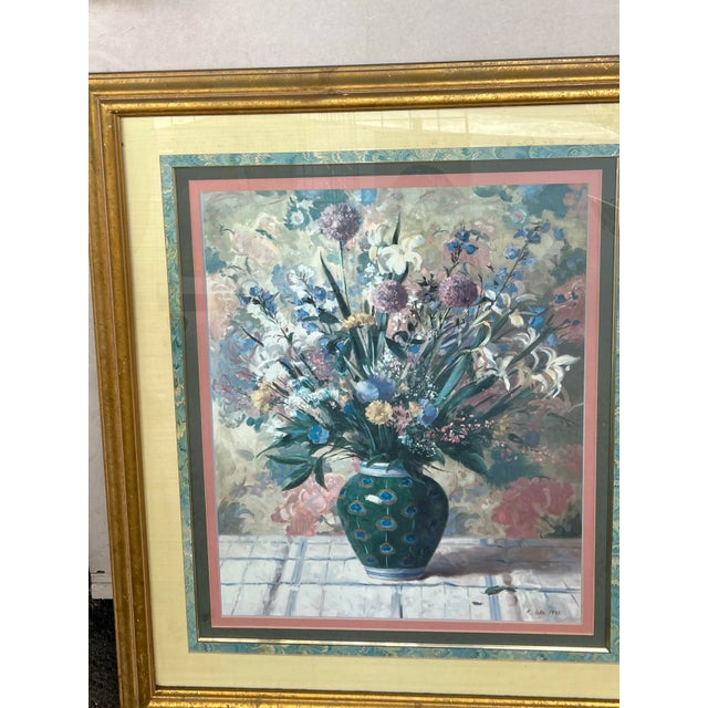 Traditional floral still life with an impressionistic touch in the background and table surface. 1980s vintage floral...