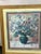 Traditional floral still life with an impressionistic touch in the background and table surface. 1980s vintage floral...