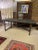 Classic Timothy Oulton dining table using reclaimed sassafras wood from weather-beaten fishing boats. The top has a...