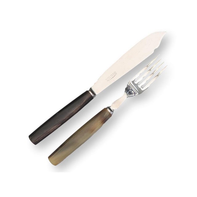 Late 19th century polished natural horn cutlery service for twelve, presented in its original fitted chest. The set...