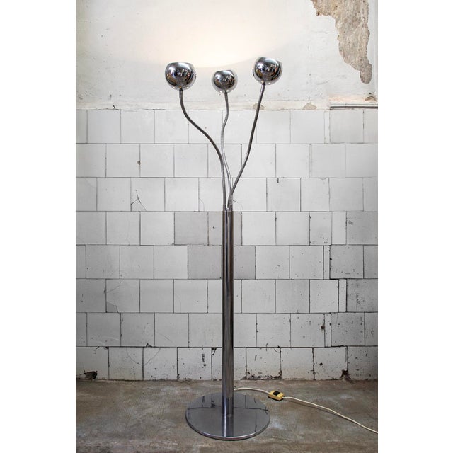 Three-light adjustable floor lamp in chromed metal. Manufacturer: Reggiani 1970s I have official proof of authenticity...