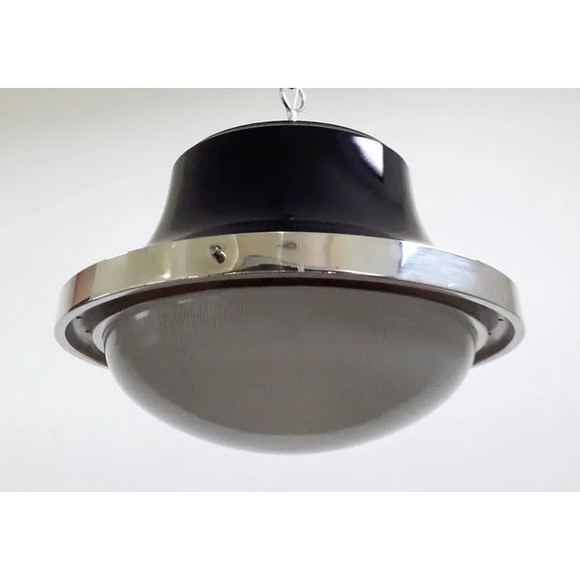 Original vintage Italian "TAU" pendant by Sergio Mazza for Artemide, with holophane pressed glass, polished nickel and...