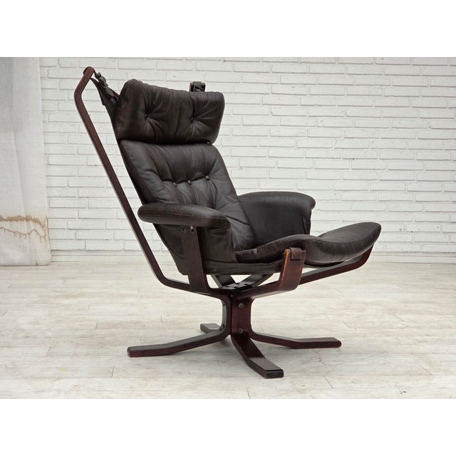 1970s, Norwegian design by Sigurd Ressel, chair, model "Falcon". Original brown furniture leather, bent wood, canvas....