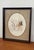 Vintage wildlife artwork depicting a deer partially concealed among branches and foliage. Executed with delicate linework...