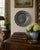 A handsome mid-20th-century European pewter wall plate centered by an elaborate heraldic coat of arms. The raised...