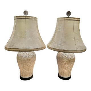 Pair of 1970s Chapman White Floral and Bird Relief Chinoiserie Lamps With White Silk Patterned Shades For Sale