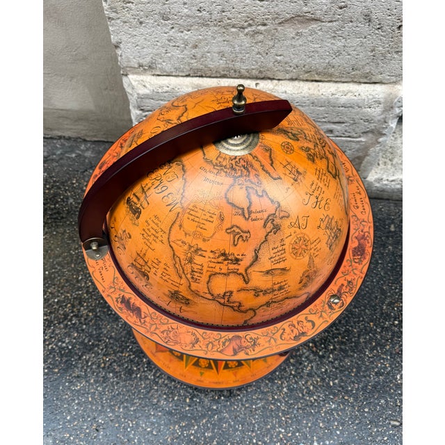 Elegant vintage globe bar cabinet from the 1980s, perfect for those who love retro and characterful furnishings. Wooden...