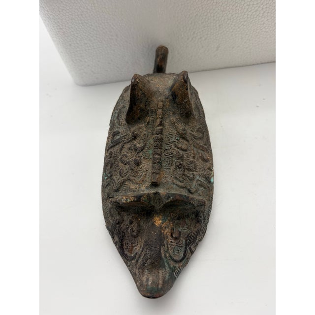 Striking Chinese archaistic bronze vessel featuring an elephant-form design with an elaborately detailed body and pouring...