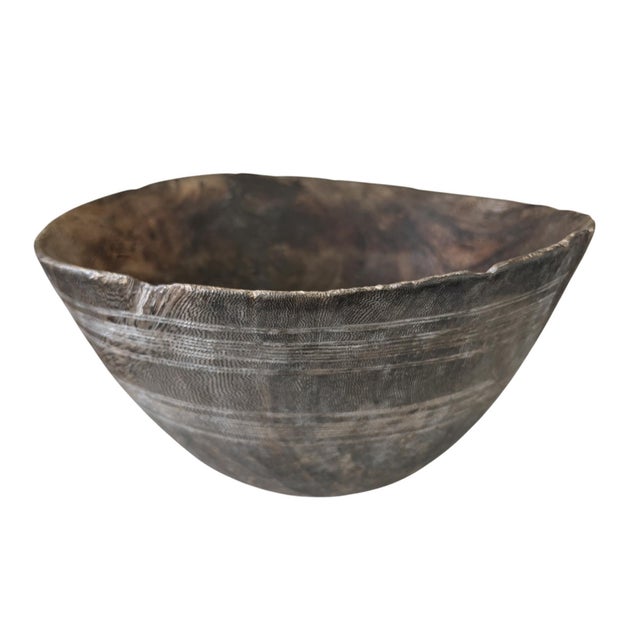 Handcrafted by the Hausa Niger nomads, these decorative wooden bowls are a one-of-a-kind piece of Saharan art. Durable...