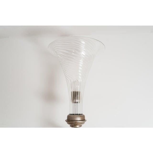 Wall light by Gamma Delta Group. The light is made out of metal with a glass cone-shaped shade. Up to 250V (Europe/UK...