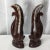 The iconic Mid Century brown glazed ceramic with white tips design is featured in this pair of mirrored swans. Elegant...